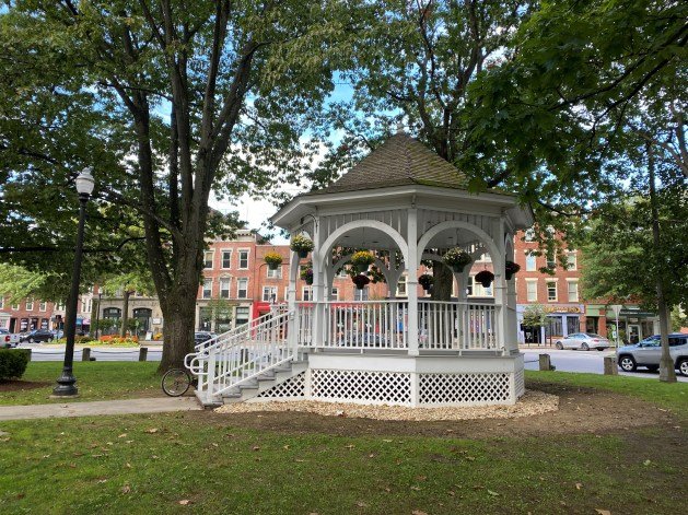 A gazebo in a park

Description automatically generated